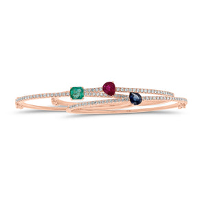 Pear-Shaped Ruby & Diamond Bangle Bracelet - 14K gold weighing 9.09 grams - 38 round diamonds weighing 0.54 carats - 1.04 ct ruby