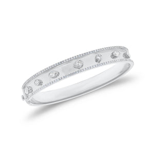 Bezel-Set Diamond Shapes Bangle Bracelet - 18K gold weighing 22.57 grams - 142 round diamonds weighing 0.86 carats - 2 marquise-shaped diamonds weighing 0.23 carats - 3 pear-shaped diamonds weighing 0.32 carats