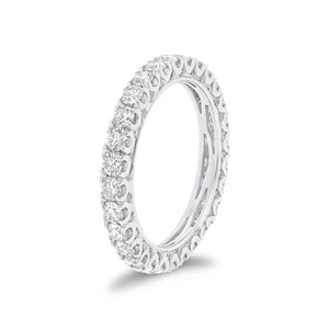 Four Prong-Set Diamond Eternity Wedding Band -18k white gold weighing 2.63 grams -84 round diamonds weighing 1.36 carats