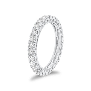 Four Prong-Set Diamond Eternity Wedding Band -18k white gold weighing 2.63 grams -84 round diamonds weighing 1.36 carats