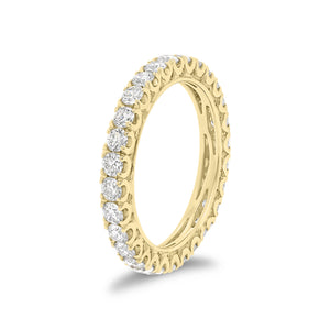 Four Prong-Set Diamond Eternity Wedding Band -18k yellow gold weighing 2.63 grams -84 round diamonds weighing 1.36 carats