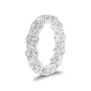 Staggered Diamond Eternity Band -18k white gold weighing 4.14 grams -12 round diamonds weighing 2.40 carats -24 round diamonds weighing 1.38 carats
