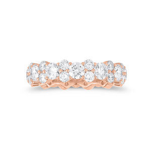 Staggered Diamond Eternity Band -18k rose gold weighing 4.14 grams -12 round diamonds weighing 2.40 carats -24 round diamonds weighing 1.38 carats