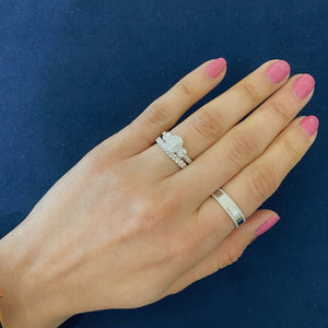 Female Model Wearing 0.81 ct Diamond Eternity Ring - 18K gold weighing 2.73 grams - 32 round diamonds weighing 0.81 carats