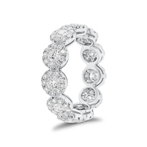 Diamond halo eternity ring -18K gold weighing 3.96 grams -11 round diamonds totaling 1.18 carats -99 round pave-set diamonds totaling 1.06 carats