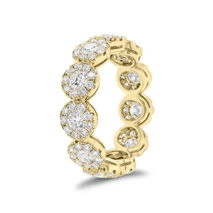 Diamond halo eternity ring -18K gold weighing 3.96 grams -11 round diamonds totaling 1.18 carats -99 round pave-set diamonds totaling 1.06 carats
