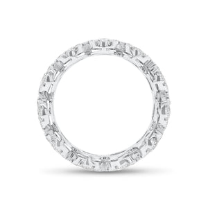 Diamond halo eternity ring -18K gold weighing 3.96 grams -11 round diamonds totaling 1.18 carats -99 round pave-set diamonds totaling 1.06 carats