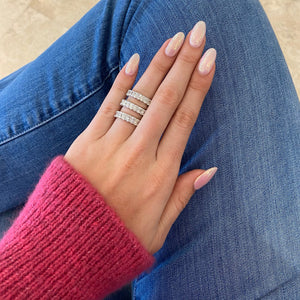 Female Model Wearing 3.55 ct Radiant-Cut Diamond Eternity Band - 18K gold weighing 3.89 grams - 23 radiant-cut diamonds weighing 3.55 carats (GIA-graded F-color, VS clarity)