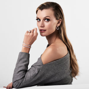 Female Model Wearing Diamond Wave Bangle -18K weighting -14.45GR -130 RD 1.42 total carat weight