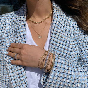 Pave Diamond Border Bangle Bracelet - 14K gold weighing 14.29 grams - 312 round diamonds weighing 0.83 carats