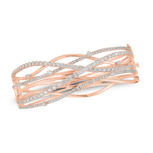 Diamond Wave Bangle - 18K rose gold weighing 36.72 grams - 49 round diamonds weighing 2.32 carats - 126 round diamonds weighing 2.10 carats