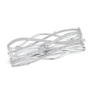 Diamond Wave Bangle - 18K white gold weighing 36.72 grams - 49 round diamonds weighing 2.32 carats - 126 round diamonds weighing 2.10 carats