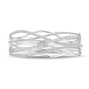 Diamond Wave Bangle - 18K white gold weighing 36.72 grams - 49 round diamonds weighing 2.32 carats - 126 round diamonds weighing 2.10 carats