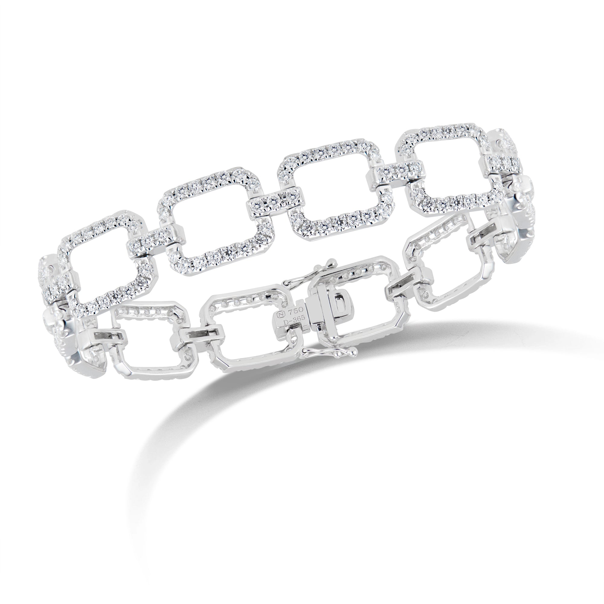 Diamond Rectangle Link Bracelet  - 18K gold weighing 19.76 grams  - 228 round diamonds totaling 3.65 carats