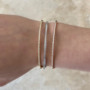 Diamond Small Classic Bangle Bracelet -14K gold weighing 8.98 grams -35 round pave-set diamonds totaling 0.49 carats