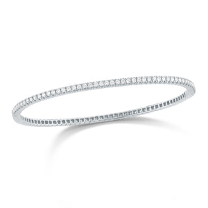 Diamond Eternity Bangle Bracelet -14K gold weighing 10 grams -94 shared prong-set round diamonds totaling 1.50 carats