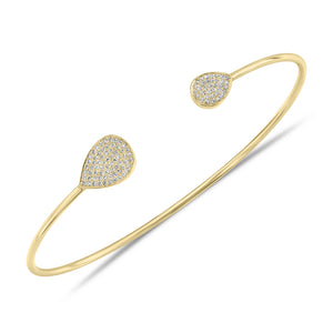 Diamond teardrop bangle bracelet - 14K gold weighting 4.18 grams. - 102 round diamonds totaling 0.23 carat weight.