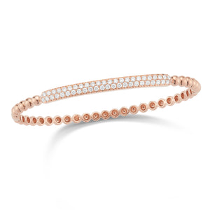 Diamond Bar Beaded Bangle Bracelet -14K gold weighing 9.69 grams -50 round pave-set diamonds totaling 0.88 carats.