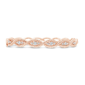 Diamond Twisted Rope Bangle Bracelet -18K gold weighing 19.45 grams -21 round diamonds totaling 0.57 carats