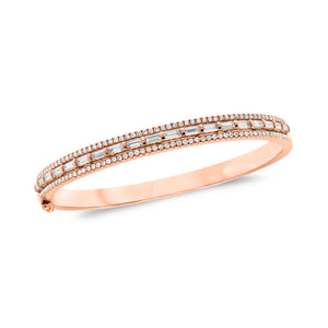 Diamond Baguette Bangle Bracelet -18K gold weighing 21.17 grams -114 round diamonds weighing .65 carats -19 straight baguettes weighing 1.42 carats