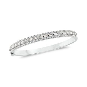 Diamond Baguette Bangle Bracelet -18K gold weighing 21.17 grams -114 round diamonds weighing .65 carats -19 straight baguettes weighing 1.42 carats