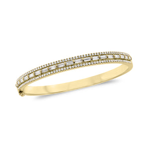 Diamond Baguette Bangle Bracelet -18K gold weighing 21.17 grams -114 round diamonds weighing .65 carats -19 straight baguettes weighing 1.42 carats
