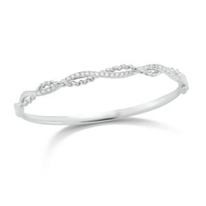 Diamond Twist Bangle Bracelet -18K gold weighing 18.57 grams -39 round shared prong-set diamonds totaling 0.70 carats.