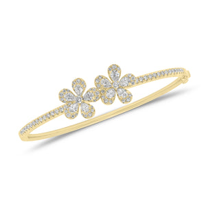 Diamond Double Flower Bangle - 18K gold weighing 16.15 grams - 10 pear-shaped diamonds weighing 1.07 grams - 81 round diamonds weighing 0.84 carats