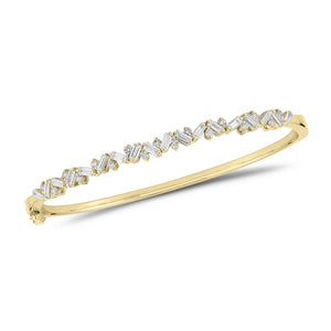 Slim Baguette and Round Diamond Bangle - 14K gold weighing 11.76 grams - 18 slim baguettes weighing 1.04 carats - 17 round diamonds weighing 0.37 carats