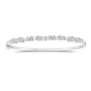 Slim Baguette and Round Diamond Bangle - 14K gold weighing 11.76 grams - 18 slim baguettes weighing 1.04 carats - 17 round diamonds weighing 0.37 carats