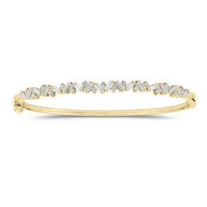 Slim Baguette and Round Diamond Bangle - 14K gold weighing 11.76 grams - 18 slim baguettes weighing 1.04 carats - 17 round diamonds weighing 0.37 carats