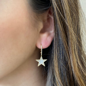 Female Model Wearing Mother of Pearl & Diamond Star Lever-Back Earrings  -14K gold weighing 3.33 grams  -128 round diamonds totaling 0.35 carats  -2 Mother of Pearl totaling 0.83 carats