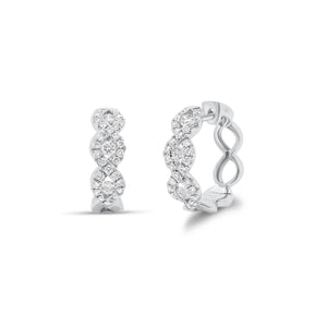 Diamond Twist hoop earrings - 18K gold weighing 5.83 grams  - 6 round diamonds totaling 0.30 carats  - 54 round diamonds totaling 0.50 carats