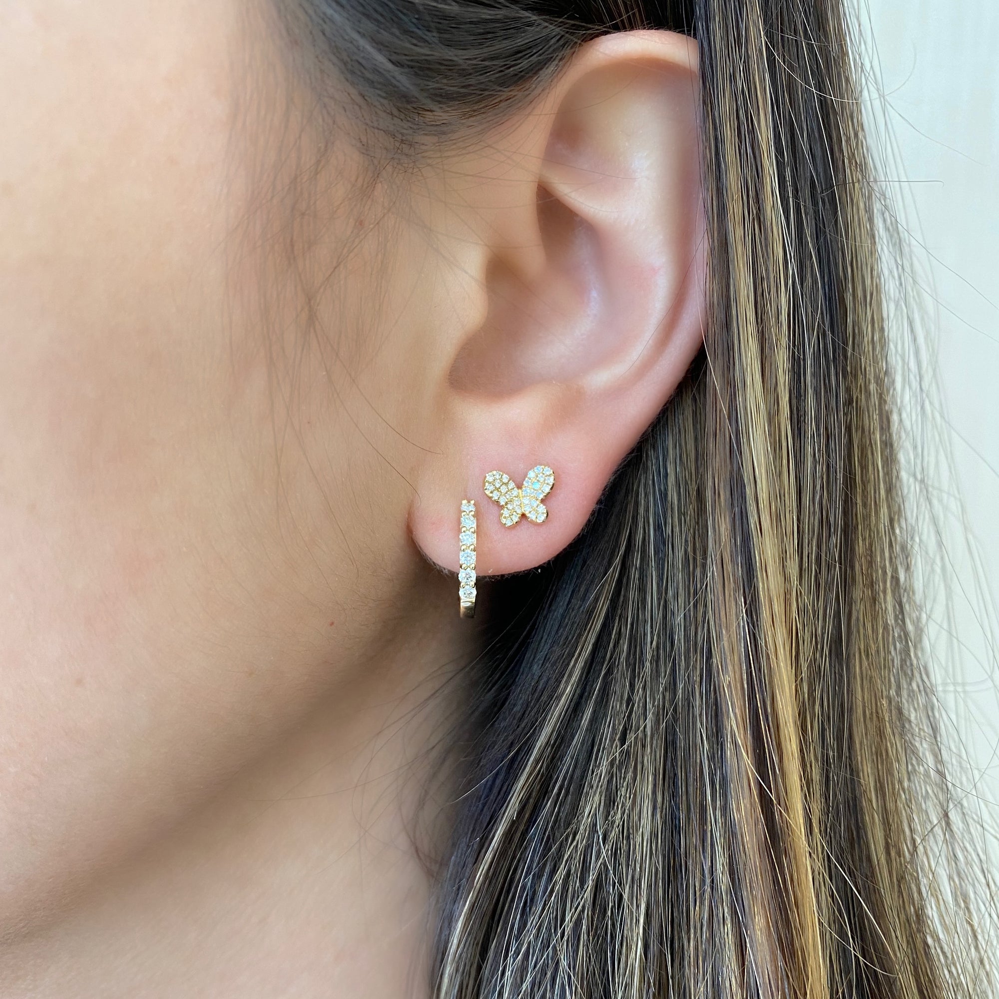Mini Diamond Butterfly Stud Earrings -14kt yellow gold weighing 1.49 grams -68 round pave set diamonds weighing .17 carats