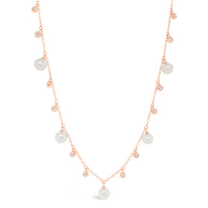 Pearl & Diamond Dangle Necklace   -14K gold weighing 2.73 grams  -12 round diamonds totaling 0.16 carats