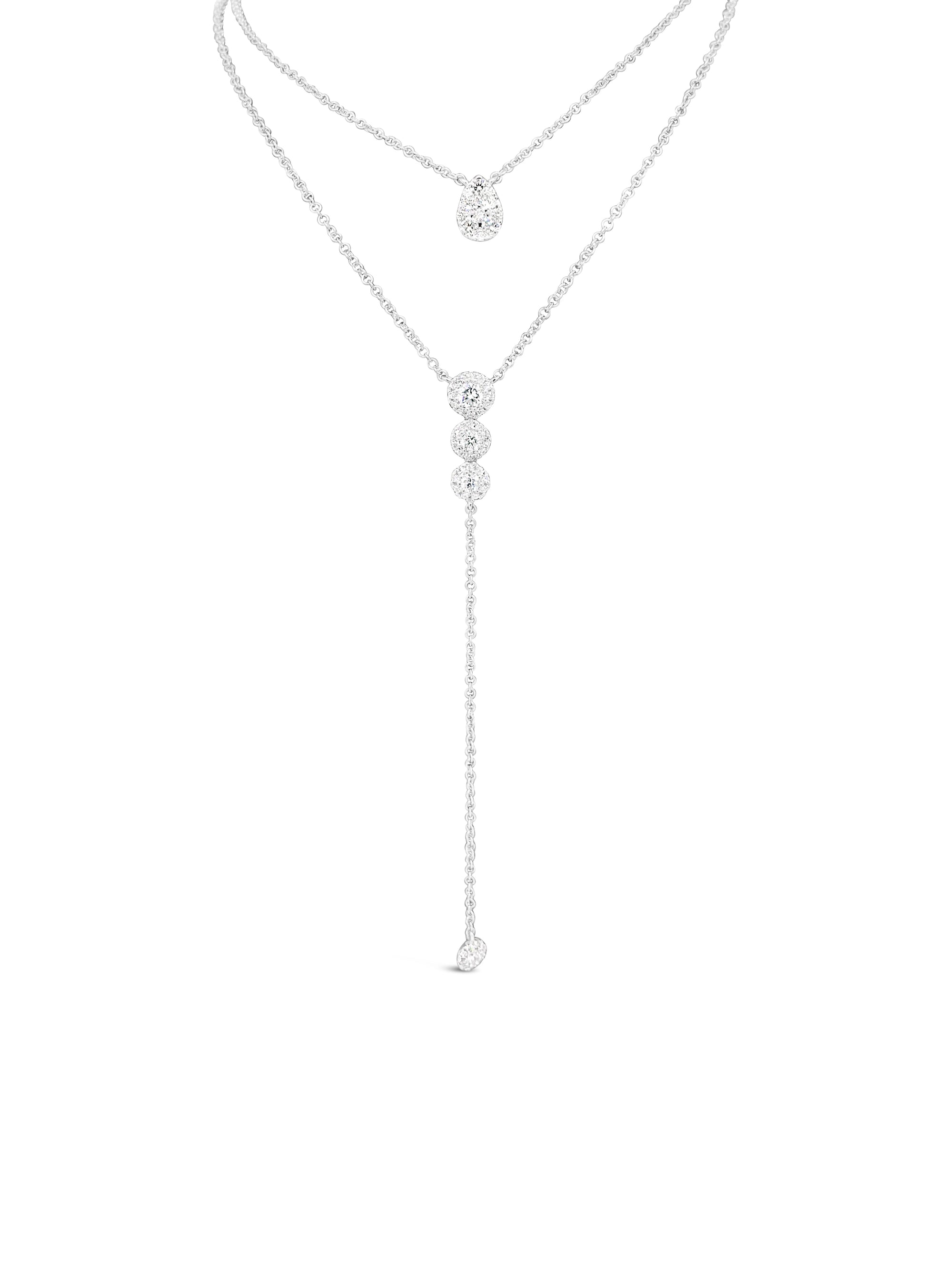 Diamond Teardrop Cluster Necklace  -14K gold weighing 1.40 grams  -12 round diamonds totaling 0.19 carats 