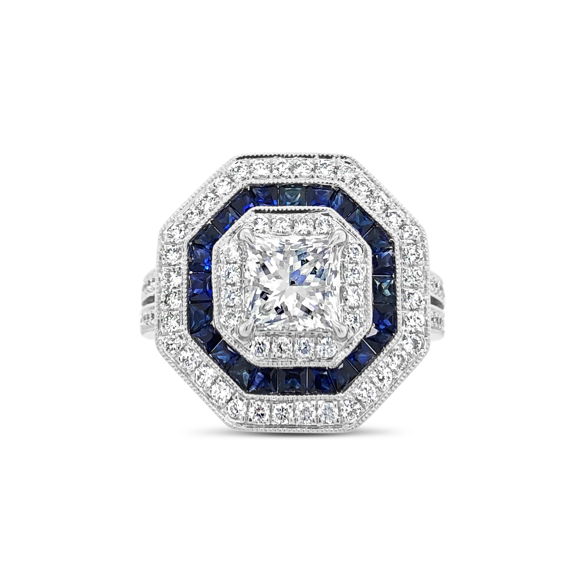 Octagonal Diamond & Sapphire Right Hand Ring  -18k gold weighing 8.13 grams  -84 round diamonds weighing .56 carats  -24 princess-cut sapphires weighing .89 carats  -1 princess-cut diamond weighing 1.13 carats with G-I2 (GIA clarity standards)
