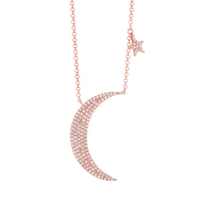 Pave Diamond Moon and Star Necklace  -14K rose gold weighing 2.50 grams  -125 round pave-set diamonds totaling 0.27 carats.