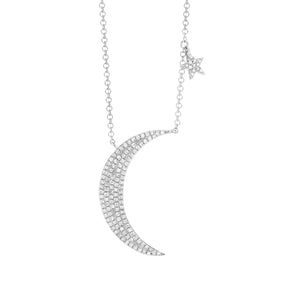Pave Diamond Moon and Star Necklace  -14K white gold weighing 2.50 grams  -125 round pave-set diamonds totaling 0.27 carats.