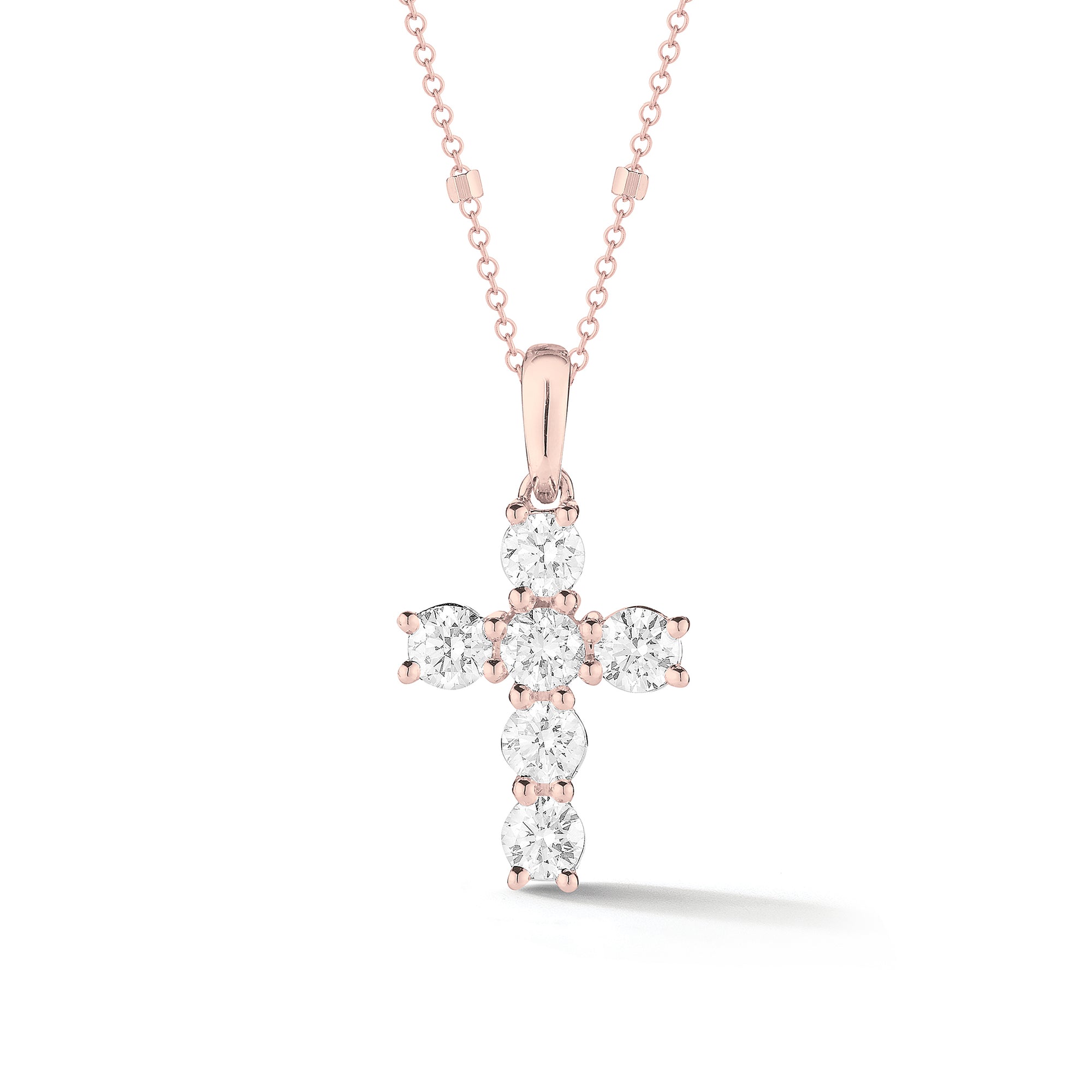 Mini Diamond Cross Pendant with Gold Accented Chain  -18K gold weighing 1.58 grams  -6 round shared prong-set brilliant diamonds totaling 0.87 carats