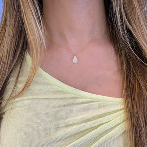 Female model wearing Pave Diamond Teardrop Pendant - 14K gold - 0.19 cts round diamonds
