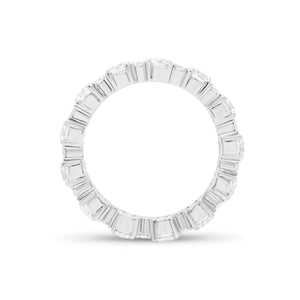 Diamond Eternity Band -18K gold weighing 3.07 grams -12 round diamonds totaling 2.13 carats -12 round diamonds totaling 0.43 carats