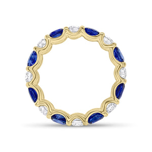 Sapphire & Diamond Eternity Ring - 18K gold weighing 2.67 grams - 8 round diamonds totaling 1.10 carats - 8 oval-shaped sapphires totaling 2.46 carats