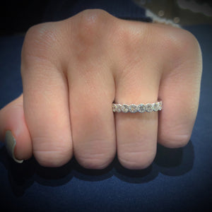 Female Model Wearing Bezel-Set Diamond Eternity Ring with Antique Milgrain -14k gold weighing 3.7 grams -20 round bezel-set diamonds weighing 1.57 carats