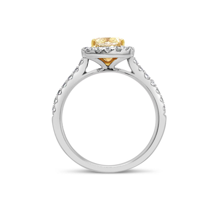 Radiant-cut Yellow Diamond Engagement Ring  -18k gold weighing 3.74 grams  -30 round diamonds weighing .48 carats  -1 yellow diamond radiant-cut weighing 1.25 carats with GIA-VS1 clarity