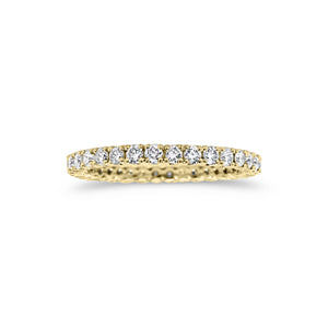 Simple diamond eternity band ring -18k gold weighing 1.61 grams -34 round four prong-set diamonds weighing .84 carats