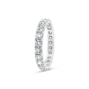 Four Prong-Set Diamond Eternity Band -18k gold weighing 2.62 grams -23 round diamonds weighing 1.68 carats