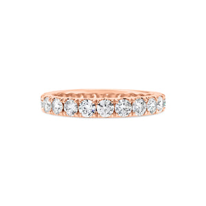 Four Prong-Set Diamond Eternity Band -18k gold weighing 2.62 grams -23 round diamonds weighing 1.68 carats