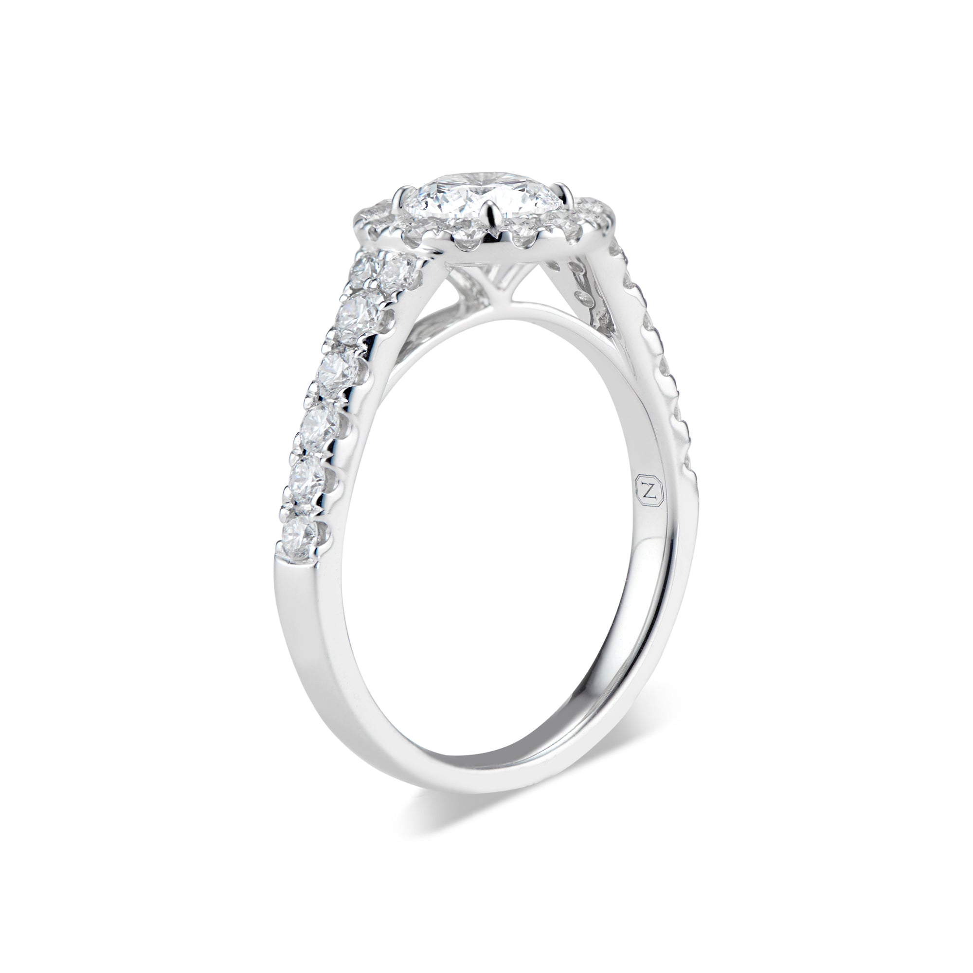 Round Halo Diamond Engagement Ring  -18K weighting 3.94 GR  - 28 round diamonds totaling 0.69 carats
