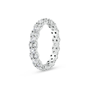 Small Prong-Set Staggered Diamond Band  -18k gold weighing 2.19 grams  -45 round prong-set diamonds weighing 1.94 grams